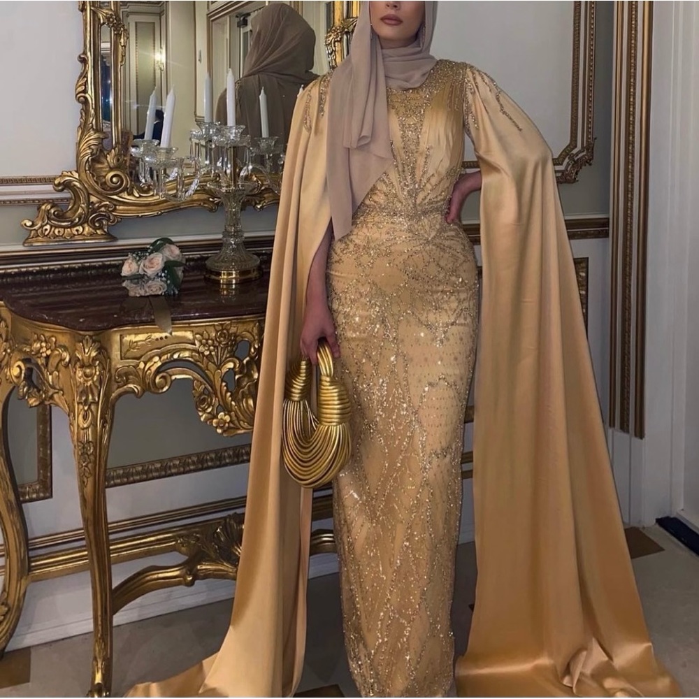 Gold dress with statement sleeves
